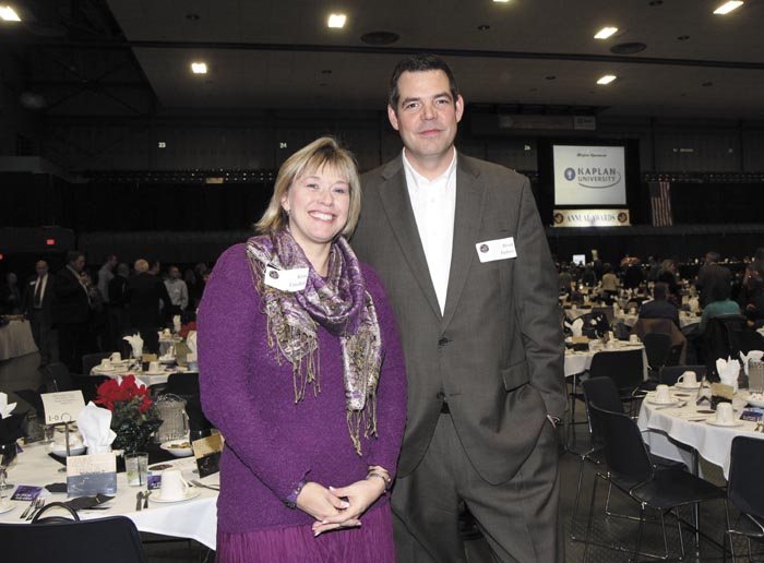 Kimberly Lindlof, of the Mid-Maine Chamber of Commerce, and Brad Frishe,r of New Dimensions Federal Credit Union, at the Kennebec Valley Chamber of Commerce's annual awards banquet at the Augusta Civic Center on Friday night.