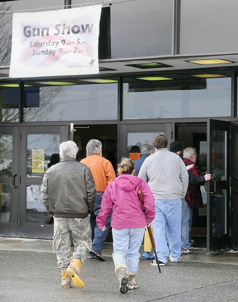 The line to get into the Augusta Gun Show on Saturday stretched out the door and included several rows snaking through the lobby of the Augusta Civic Center.