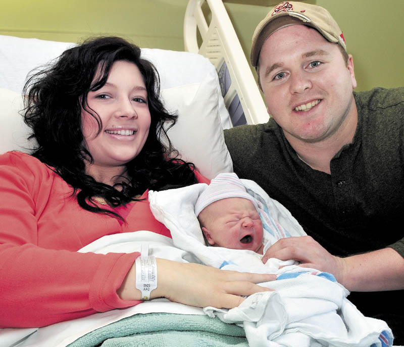 Parents Hannah Skoczenski and Chris Duffy hold their newborn son, Finnegan, who was born at 12:33 a.m. on Tuesday at Inland Hospital in Waterville.
