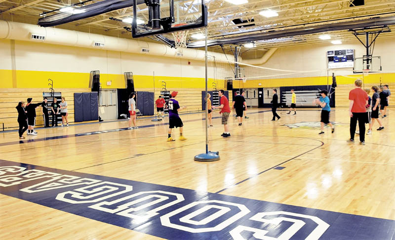 Staff photo by David Leaming NEW AND IMPROVED: Mt. Blue High School students participate in physical education class in the new gymnasium at the Farmington school recently.