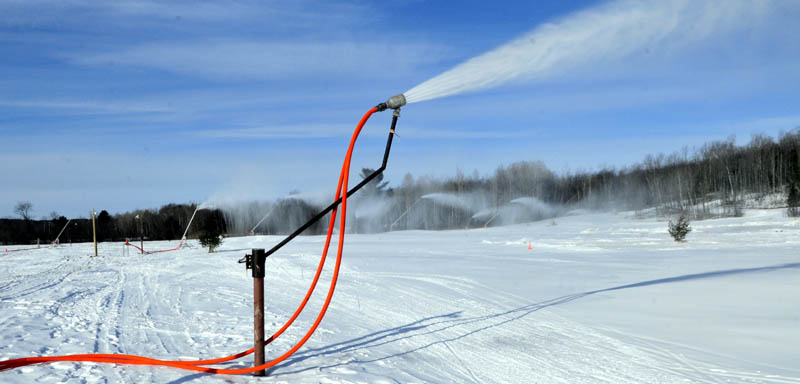 New snow-making equipment is being put to work covering trails for skiers at the Quarry Road Recreation Area in Waterville.