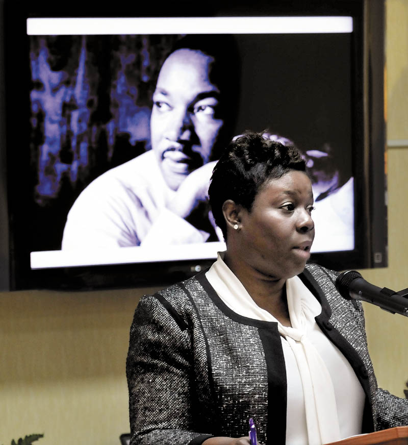Tashia Bradley gives the keynote address during the 27th annual Martin Luther King Jr. Day community breakfast at the Spectrum Generations Muskie Center in Waterville on Monday.