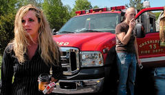 Grand View Topless Coffee Shop employee Krista MacIntyre, and former employee Alan Brown, arrive at the fire scene that destroyed the topless restaurant in Vassalboro on June 6, 2009. The state argued at trial that Raymond Bellavance Jr., who was dating MacIntyre, burned the building in revenge against coffee shop owner Donald Crabtree, whom MacIntyre was also dating.