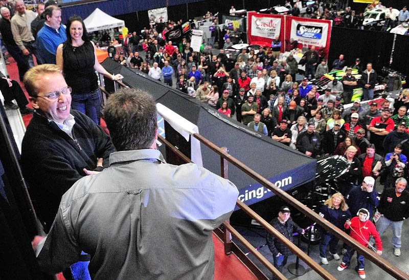 Ricky Craven, left, talks with show promoter Steve Perry after being introduced as one of the Top 25 people in regional racing during the Northeast Motorsports Show on Friday at the Augusta Civic Center.