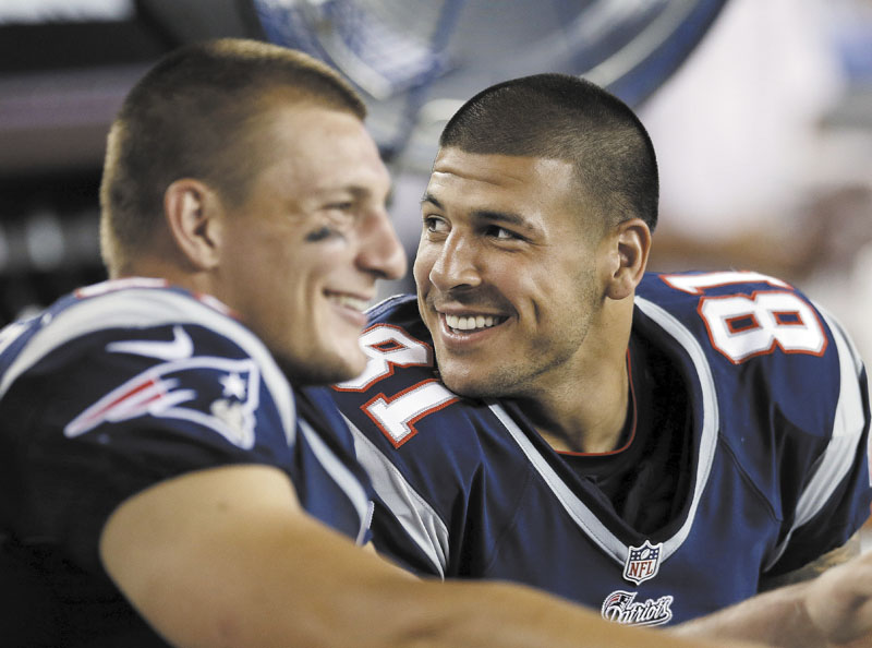 DYNAMIC DUO: New England Patriots tight ends Aaron Hernandez, right, and Rob Gronkowski, left, have played just five games together this season because of injuries. Now the Patriots dangerous tight ends are back and posing a major threat to the Houston Texans in Sunday’s AFC divisional playoff game. Emotion Night