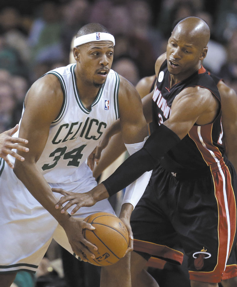 EXTRA DUTIES: Boston Celtics forward Paul Pierce, left, will likely take on more ball handling duties now that point guard Rajon Rondo is out for the season with a torn ACL.