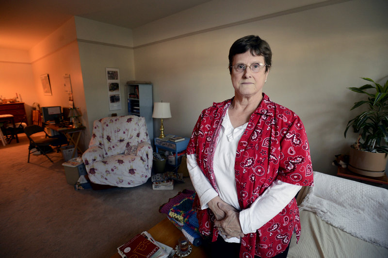 Shirley Jackson, 68, seen Thursday in her South Berwick apartment, says she can no longer earn money other than her Social Security income or she will be dropped from Medicaid rolls because of financial eligibility requirements. She says while she feels lucky compared to others who will be cut, her income leaves little room for even modest extra spending.