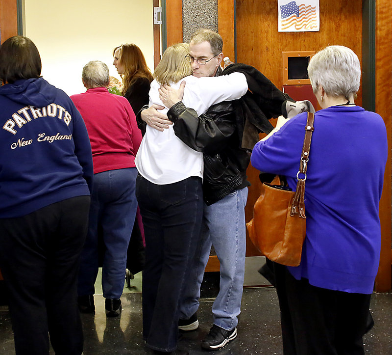 Mark Gerber, Renee Sandora's step-father, hugs Wanda Estes, Sandora's aunt, after Joel Hayden was found guilty of killing Sandora, the mother of his four children, and his longtime friend Trevor Mills in the Cumberland County Courthouse in Portland on Monday afternoon January 14, 2013.