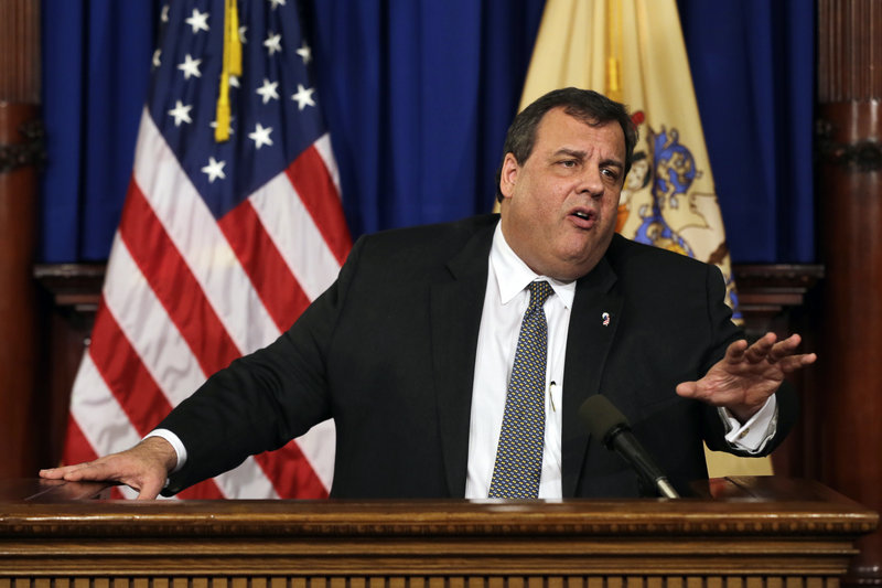 New Jersey Gov. Chris Christie answers a question Thursday at a news conference where he called an NRA ad focusing on President Obama’s daughters “reprehensible.”
