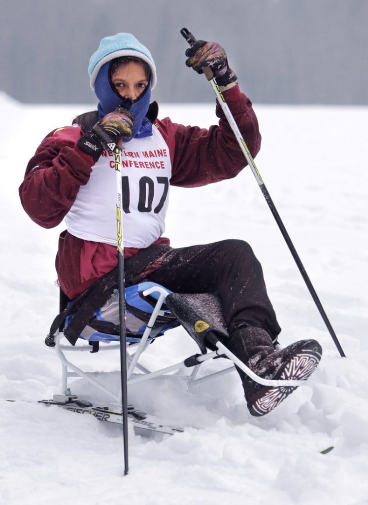 Christina Kouros uses a sit-ski to compete on the Cape Elizabeth Nordic ski team in 2011. The federal Department of Education on Friday told schools nationwide that they must provide sports opportunities for disabled students. State officials say that is already happening in Maine.