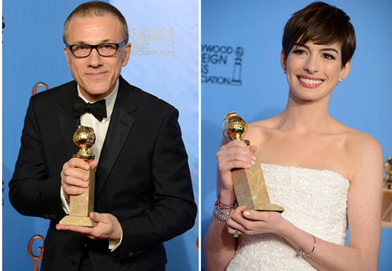 Christoph Waltz and Anne Hathaway pose with their awards backstage at the 70th Annual Golden Globe Awards on Sunday. Waltz won for best performance by an actor in a supporting role in a motion picture for “Django Unchained.” Hathaway won for best performance by an actress in a supporting role in a motion picture in "Les Miserables."