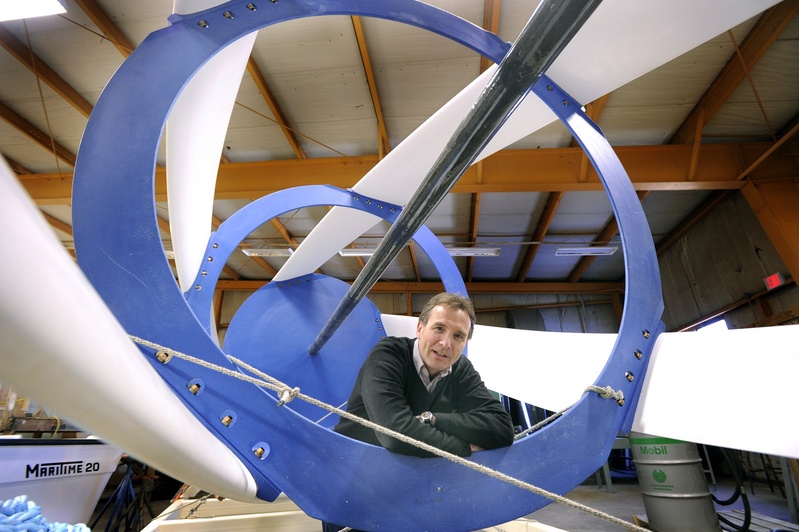 John Ferland, vice president of project development with Ocean Renewable Power Co., stands inside one of the company's all-composite tidal turbines.