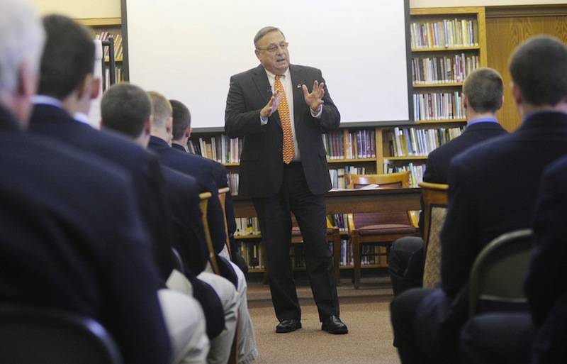In this May 2012 file photo, Gov. Paul LePage speaks with Cheverus High School students. The LePage administration is proposing a $530,000 school voucher program for low-income students to attend certain private schools or public schools outside of their districts.