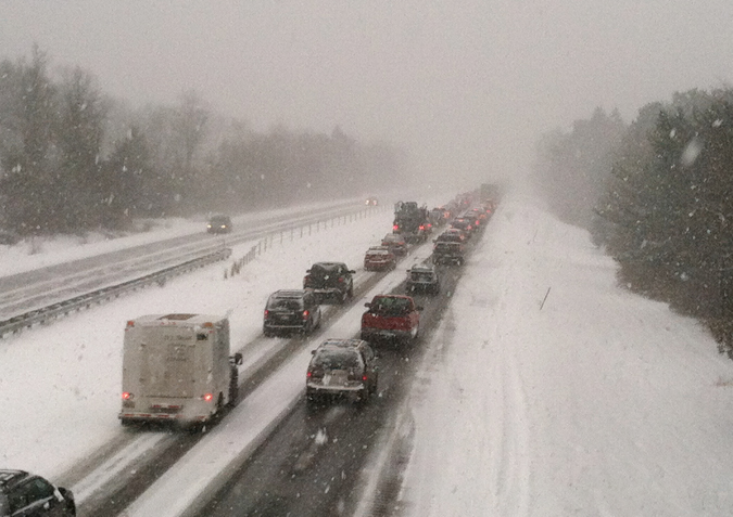 This view from Tuttle Road in Cumberland shows traffic stalled on I-295 southbound Friday morning after a 19-vehicle pileup.
