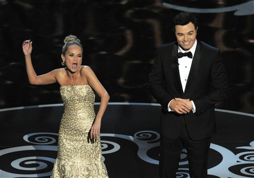 Host Seth MacFarlane and actress Kristin Chenoweth perform a song dedicated to the "losers" during the finale of the Oscars at the Dolby Theatre on Sunday in Los Angeles.
