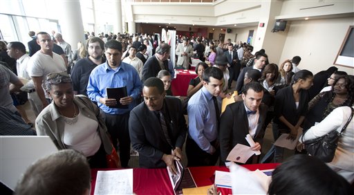 Job seekers fill a room at the job fair in Sunrise, Fla., on Tuesday. U.S. employers added 157,000 jobs in January, and hiring was much stronger at the end of 2012 than previously thought, providing reassurance that the job market held steady even as economic growth stalled, according to Labor Department reports released Friday.