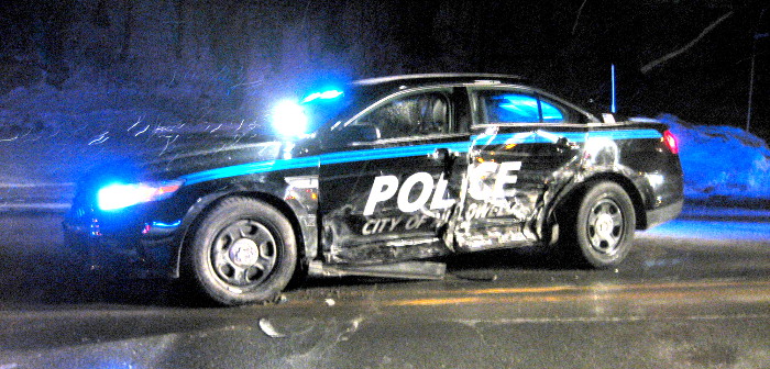 A Hallowell Police Department 2013 Ford Taurus police cruiser had its rear axle twisted and left doors crushed, likely totaling it, following a Saturday evening accident on Water Street near Cafe de Bangkok, according to Hallowell Police Sgt. Christopher Hutchings.