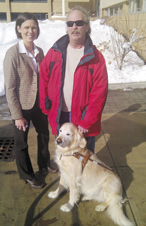 Pictured are Bruce Archer of Presque Isle, right, his Seeing Eye dog, Flash, and Kristin Aiello, an attorney with the Disability Rights Center who represented Archer in the discrimination complaint he filed with the Maine Human Rights Commission.
