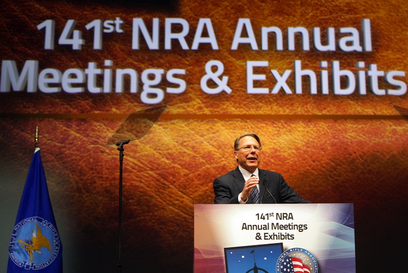 In this April 14, 2012, file photo, Wayne LaPierre Jr., executive vice president and chief executive officer of the National Rifle Association, speaks at its members annual meeting. LaPierre renewed his call for armed guards in all schools on Thursday.