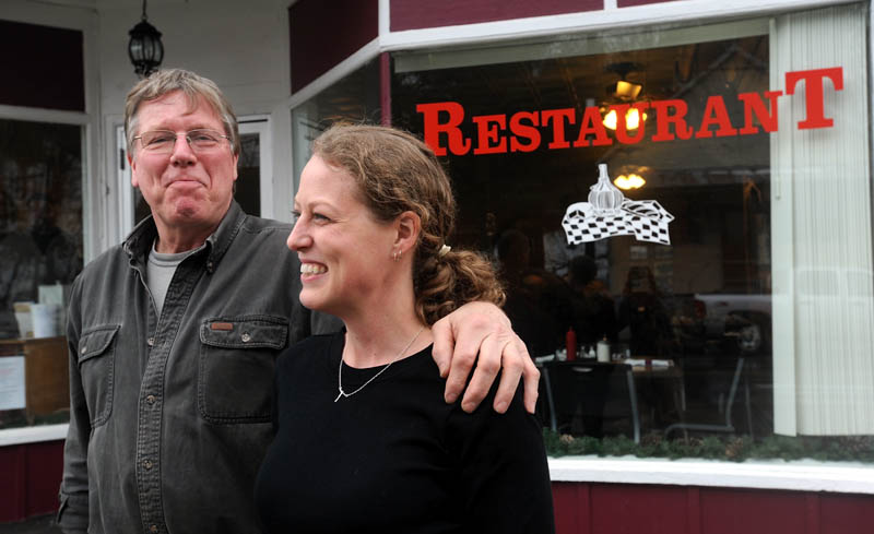 Jay Strickland and his daughter, Amber, pose for a portrait outside Thompson's Restaurant on Main Street in Bingham on Wednesday.