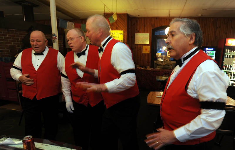 Barber shop quartet Buck and a Quarter performs at Grand Central Cafe at Railroad Square in Waterville Wednesday night.
