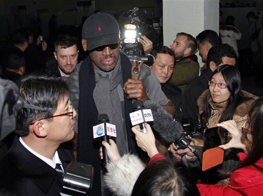 Flamboyant former NBA star Dennis Rodman is surrounded by journalists upon arrival at Pyongyang Airport, North Korea, on Tuesday.