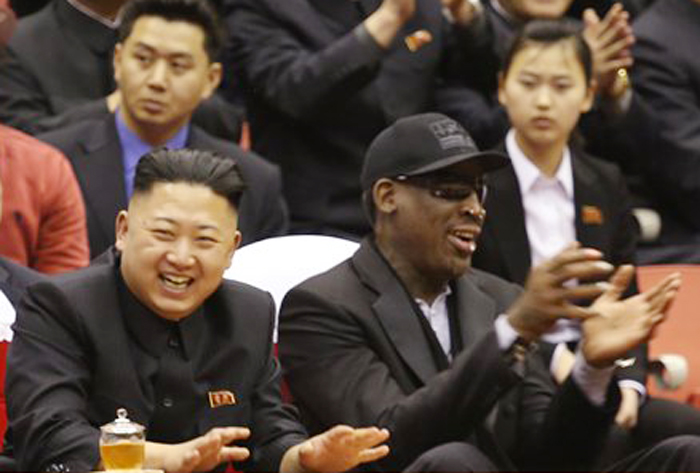 North Korean leader Kim Jong Un, left, and former NBA star Dennis Rodman watch North Korean and U.S. players in an exhibition basketball game at an arena in Pyongyang on Thursday.