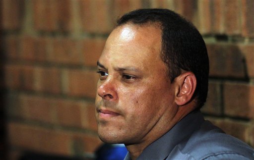 Former lead investigator Hilton Botha sits in the witness box during the bail hearing on Wednesday for Oscar Pistorius.
