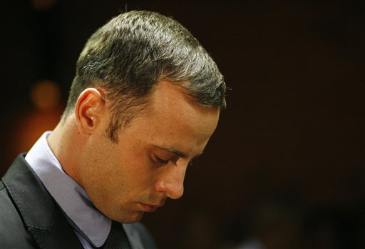 Olympic athlete Oscar Pistorius stands during his bail hearing at the magistrate court in Pretoria, South Africa on Thursday.