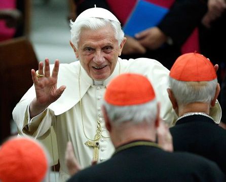 In this Nov. 26, 2011, photo, Pope Benedict XVI leaves Paul VI hall after attending a concert at the Vatican.