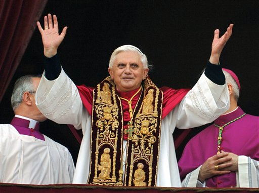 Pope Benedict XVI greets the crowd from the central balcony of St. Peter's Basilica moments after being elected, in this April 19, 2005, photo.