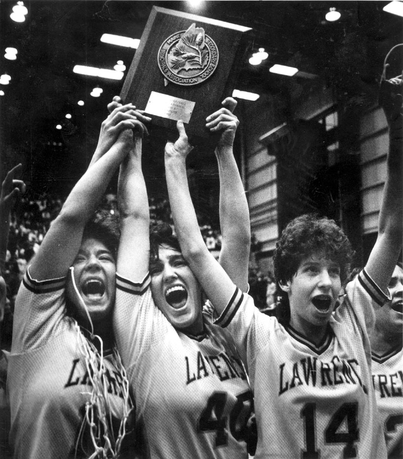 LASTING MEMORY: Lawrence’s Cindy Blodgett, far right, Taffy Witham, left, and Marsha Hamlin, center, after winning the Eastern A title in March 1992 at the Bangor Auditorium. blodgett