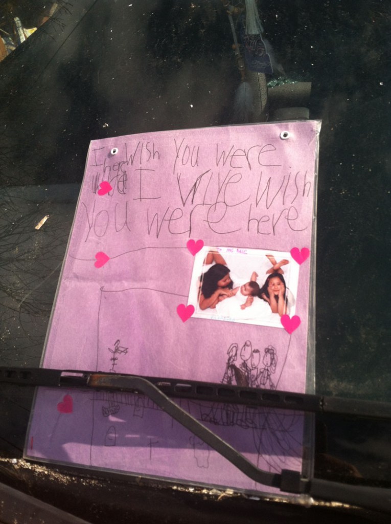 A child's card was tucked under the windshield wiper of a car parked in front of Dale Ann Fussell's apartment on Wednesday.