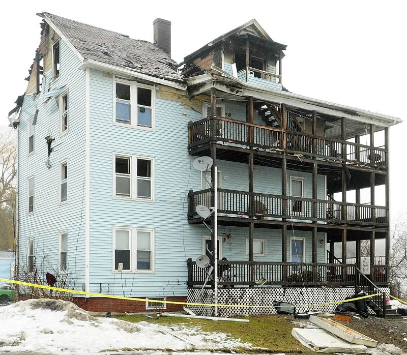 This photo show the damage to 1 Penobscot St. on Jan. 30, 2013, the day after it was heavily damaged by a fire. The Fire Marshal's Office seeks a witness who left the scene five to 10 minutes before the fire was reported, saying he is not a suspect but may have information that could help solve the origin of the fire.
