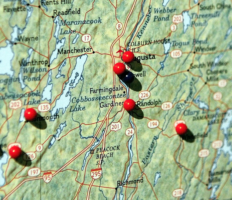 Pins on the map mark cities and towns that passed resolutions opposing the state budget during a Maine People's Alliance event on Tuesday.