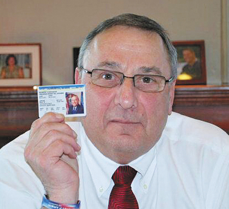 Gov. Paul LePage displays his concealed-carry permit in a photo posted to his Twitter account on Thursday. “If newspapers want to know who has concealed weapons permits, they should know I do,” LePage said.