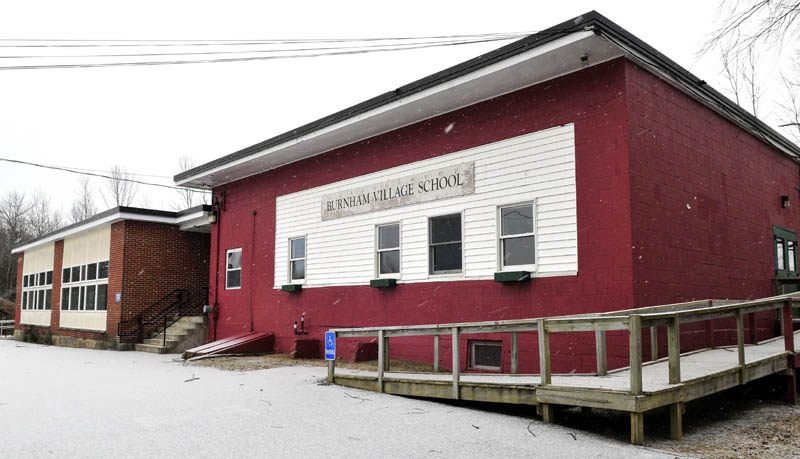The closed Burnham Village School on Wednesday. Town officials are still discussing how to utilize the building after voters approved using it as a town office.