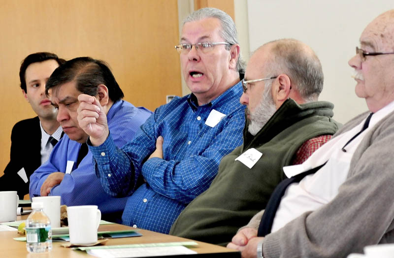 Gary McGrane, a Franklin County Commissioner, makes a point in reaction to measures to reduce expenses offered by Franklin Memorial Hospital/ Franklin Community Health Network President and CEO Rebecca Ryder on Wednesday.