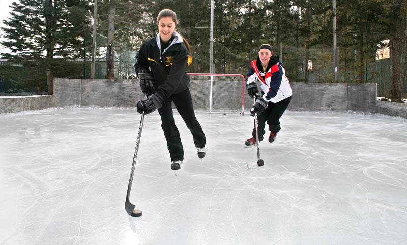 Jena Nawfel, left, and her friend Anne-Marie Provencal at Nawfel's home rink in Waterville.