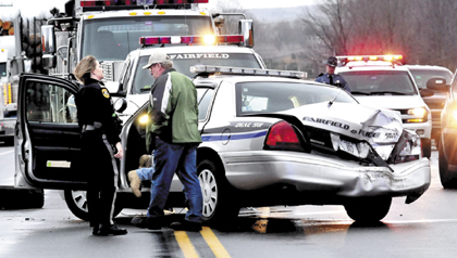 Fairfield police officer William Beaulieu cruiser after it collided with a tractor trailer truck on U.S. Route 201 in Fairfield in January.