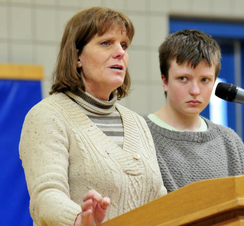 Yvonne Batson, of Fairfield, and her son, Nathanael, speaks while awarding the Brendan Batson Award to Madison Memorial High School student Lannie Howes, for her success in fundraising for Make-A-Wish Maine, on Thursday.