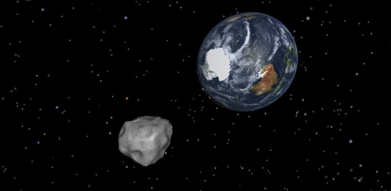 Image shows a simulation of asteroid 2012 DA14 approaching from the south as it passes through the Earth-moon system next Friday. The 150-foot object will pass within 17,100 miles of the Earth.