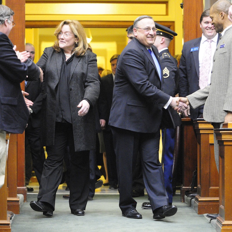 Leigh I. Saufley Chief Justice of the Maine Supreme Judicial Court, left, and Gov. Paul LePage enter the House before he delivers his the State of the State address on Tuesday, Feb. 5, 2013 at the State House in Augusta. LePage is shaking hands with Rep. Craig V. Hickman, D-Winthrop.