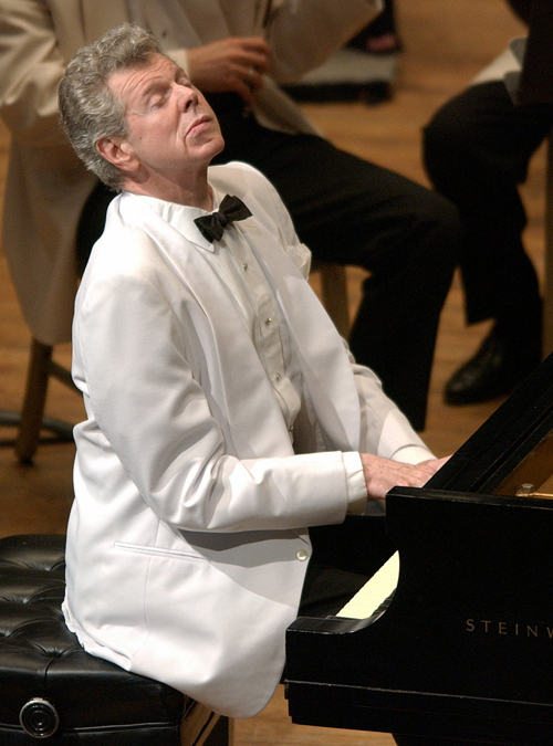 Pianist Van Cliburn performs with the Boston Symphony Orchestra at Tanglewood in Lenox, Mass., on July 12, 2003.
