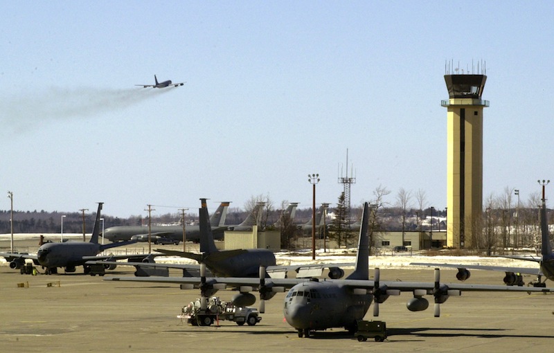 In this 2003 file photo, a KC-135 refueling tanker takes off at Bangor International Airport as other planes sit below the airport control tower. Bangor International Airport got preliminary word that its air traffic control tower may continue operating 24 hours a day until July as the Federal Aviation Administration decides how to implement spending cuts. John Patriquin