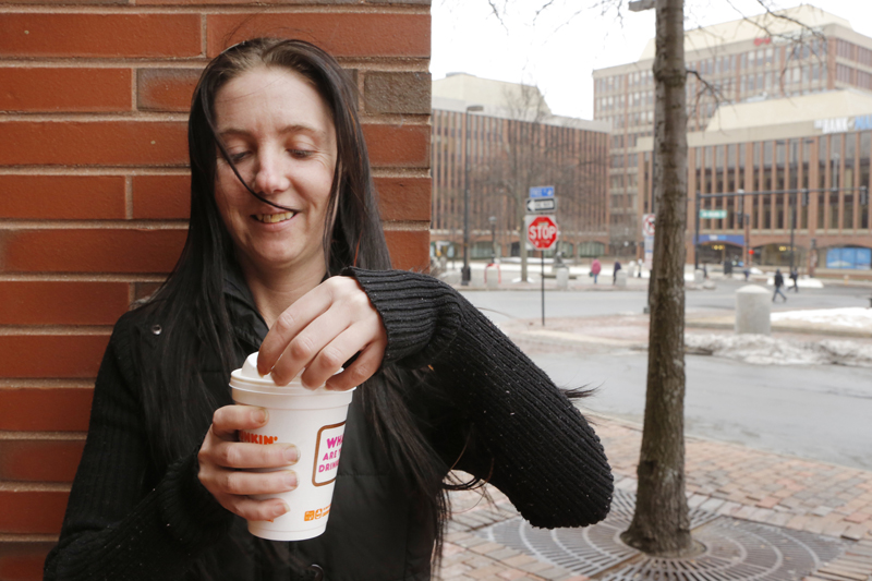 Shawna Humiston of Portland says she wouldn't support a ban on polystyrene because she doesn't think other types of to-go cups keep coffee warm enough. Photographed outside the Dunkin' Donuts on Free Street in Portland on Thursday, March 7, 2013.