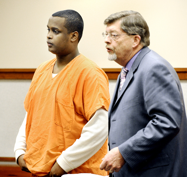 A bail reduction was denied for Mohammed Abdi, shown here with his attorney Clifford Strike in Cumberland County Unified Criminal Court on Tuesday.