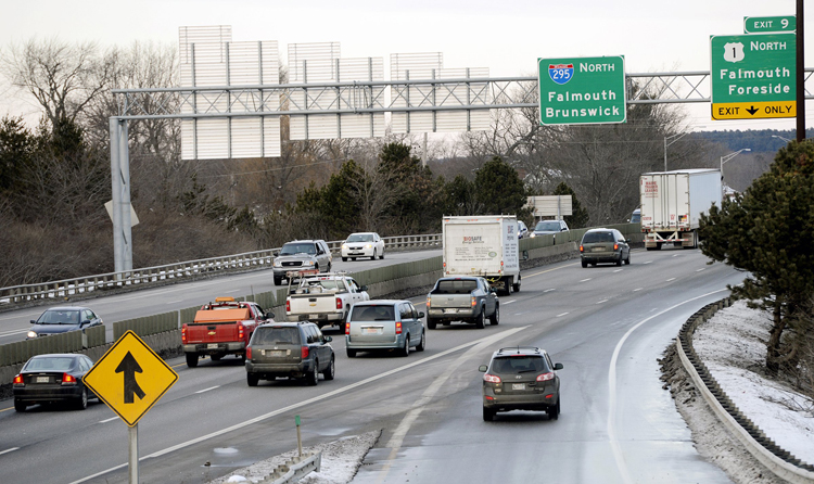 Traffic merges onto Interstate 295 north from Baxter Boulevard in Portland recently. Under the bill pending before the Legislature's Transportation Committee, the state could increase the interstate's speed limit following engineering and safety reviews.