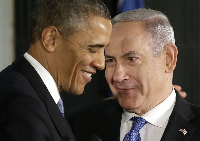 President Obama and Israeli Prime Minister Benjamin Netanyahu huddle during their joint news conference in Jerusalem, Israel, on Wednesday.