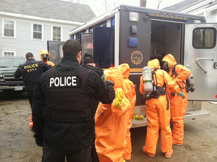 Maine Drug Enforcement Agents, along with several other agencies, search an apartment at 24 Dummer St. in Bath for a suspected meth lab on Wednesday. Photo provided by the Maine Department of Public Safety.